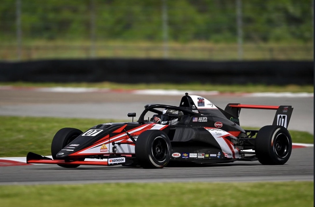 Car #07 — apex, front wing loaded